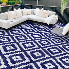 Mattitude 8'x10' waterproof outdoor rug in blue, front view