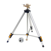 Melnor Metal Pulsating Sprinkler on tripod with garden background