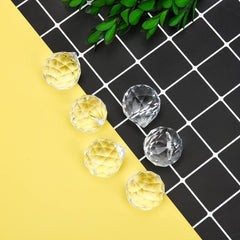 MerryNine Clear Crystal Sun Catcher Prism Balls arranged in a decorative setting