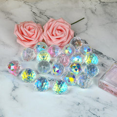 MerryNine crystal sun catchers hanging in a sunny window