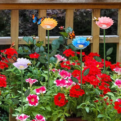 Metal bee watering stations with green stems