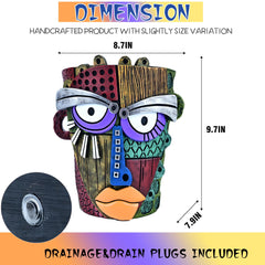 Midogaigai Abstract Face Planter Pot with plants in a home setting