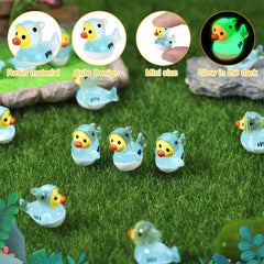 Mini shark resin ducks arranged in a decorative setting