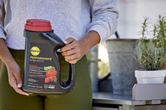 Miracle-Gro Performance Organics Edibles Plant Nutrition Granules with tomatoes and herbs