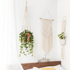 Mkono Macrame Plant Hanger 35 Inch Ivory with plant in a living room