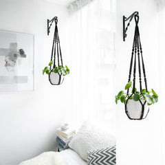 Mkono macrame plant hanger black cotton displayed indoors