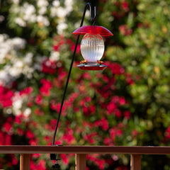 More Birds deck hook with bird feeder hanging from it