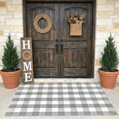 MUBIN Buffalo Plaid Rug on a patio with outdoor furniture
