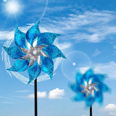 Multiple Hausse pinwheels set up in a garden