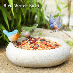 MUMTOP Bird Bath placed on a garden table with water inside