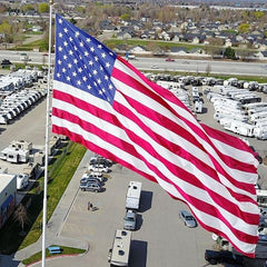 NatFlag 10x15 FT Heavy Duty Nylon US Flag front view with embroidered stars