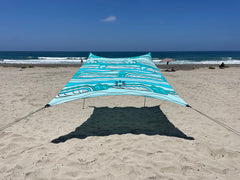 Neso Portable Beach Tent Swells model front view