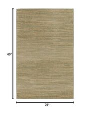 Nourison Essentials Green Gold Area Rug on patio