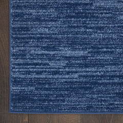 Nourison Essentials Outdoor Rug placed on a patio