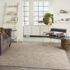 Nourison Positano beige runner rug displayed on a patio