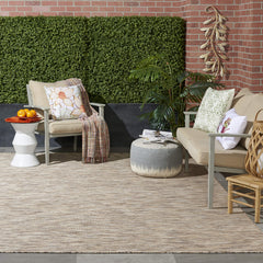 Nourison Positano beige runner rug in a dining room setting