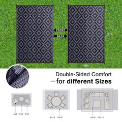 OLANLY Outdoor Rug 6x9 ft showing reversible black and grey sides