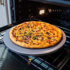 Old Stone pizza stone in use with homemade pizza