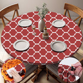 opstellen round tablecloth in Red Morocco design on a dining table