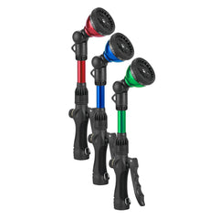 Orbit 14-Inch Wand in a garden setting watering plants