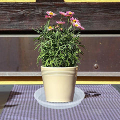 OVZILKI plant saucer in use with flower pot