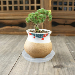 OVZILKI plant saucer in use with flower pot