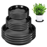 PeoMev 12-pack plant saucers in various sizes, black plastic trays