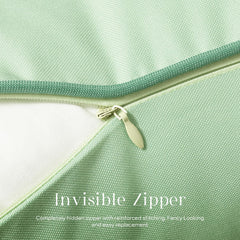 Phantoscope pack of 2 outdoor pillow covers sage green on patio furniture