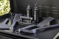 PIT BOSS cleaning brush included in the griddle tool kit