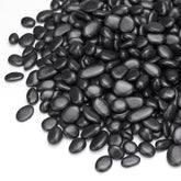 Pulovin 5 lbs black pebbles front view in packaging