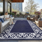 PureCozy 10' x 14' Outdoor Rug in Navy Blue geometric design