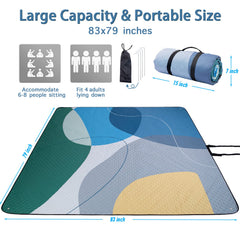 PY SUPER MODE picnic blanket laid out on grass, with food and drinks