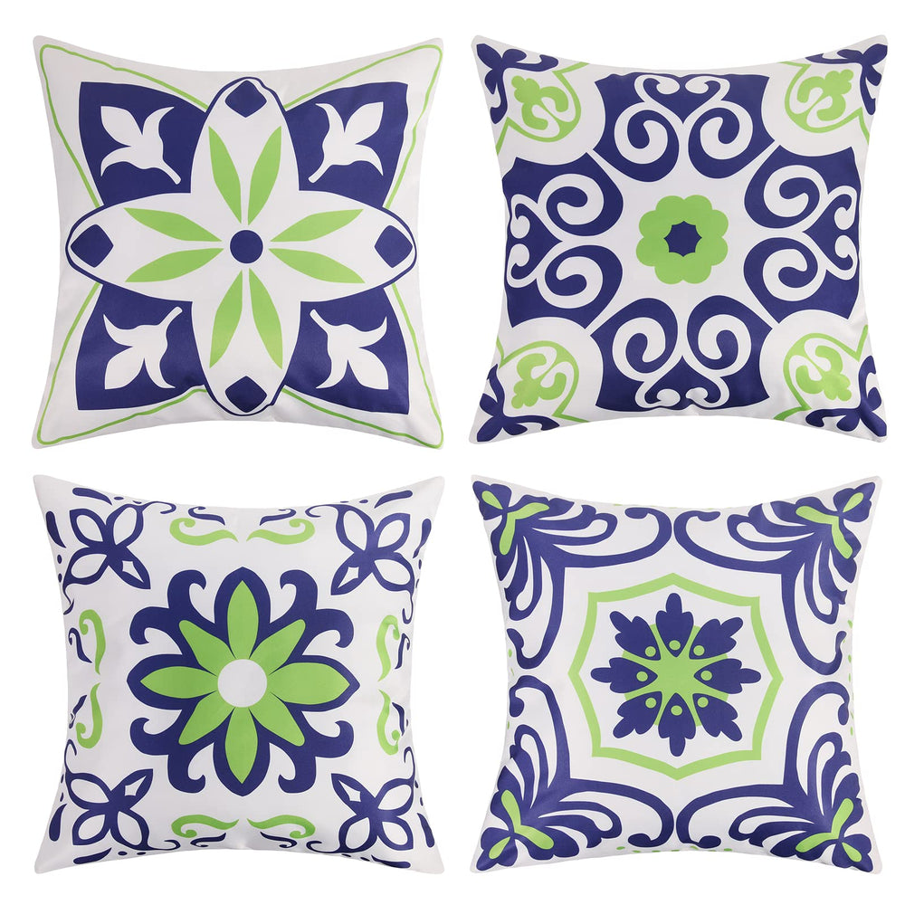 Pyonic outdoor pillow covers set of 4 in navy blue with floral print