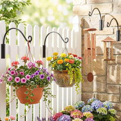Qiang Ni plant hanger holding a flower basket outdoors