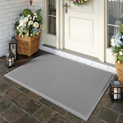 QiCaiJia doormat on tiled floor