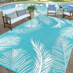 Reversible design of Pauwer outdoor rug showing leaf pattern