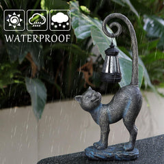 REYISO Cat Statue illuminated at night