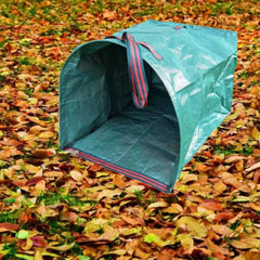 RISETEX Yard Waste Bag filled with leaves in a garden