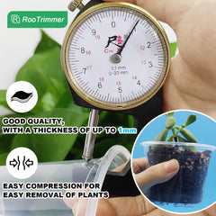 RooTrimmer clear seedling pot with seedlings growing
