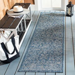 SAFAVIEH Washable Rug Outdoor Courtyard Collection, Navy/Ivory front view