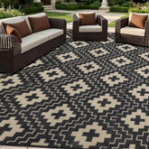 SAND MINE 6x9 ft outdoor rug in black and beige geometric pattern