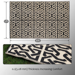 SAND MINE Outdoor Mat set up on a patio with furniture