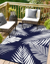 sarben outdoor rug 5'x8' blue white palm leaf design front view
