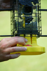 Side view of Brome Squirrel Solution 200 bird feeder