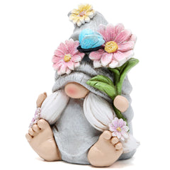 Side view of Hodao Spring Gnome Figurine, Grey Woman with floral details