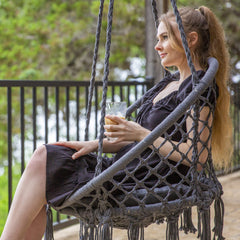 Side view of SUNCREAT Hammock Chair showing tassels