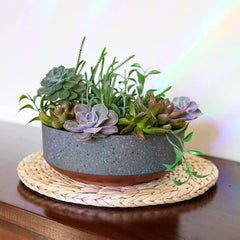 Side view of The HC Companies Capri Bowl showing drainage hole