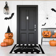 Side view of Tinideya Halloween door mat and striped rug