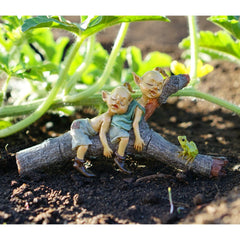 Side view of Top Collection Miniature Fairy Garden Pixies on log