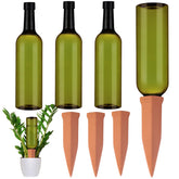SiliFine terracotta watering spike set with dark green bottles